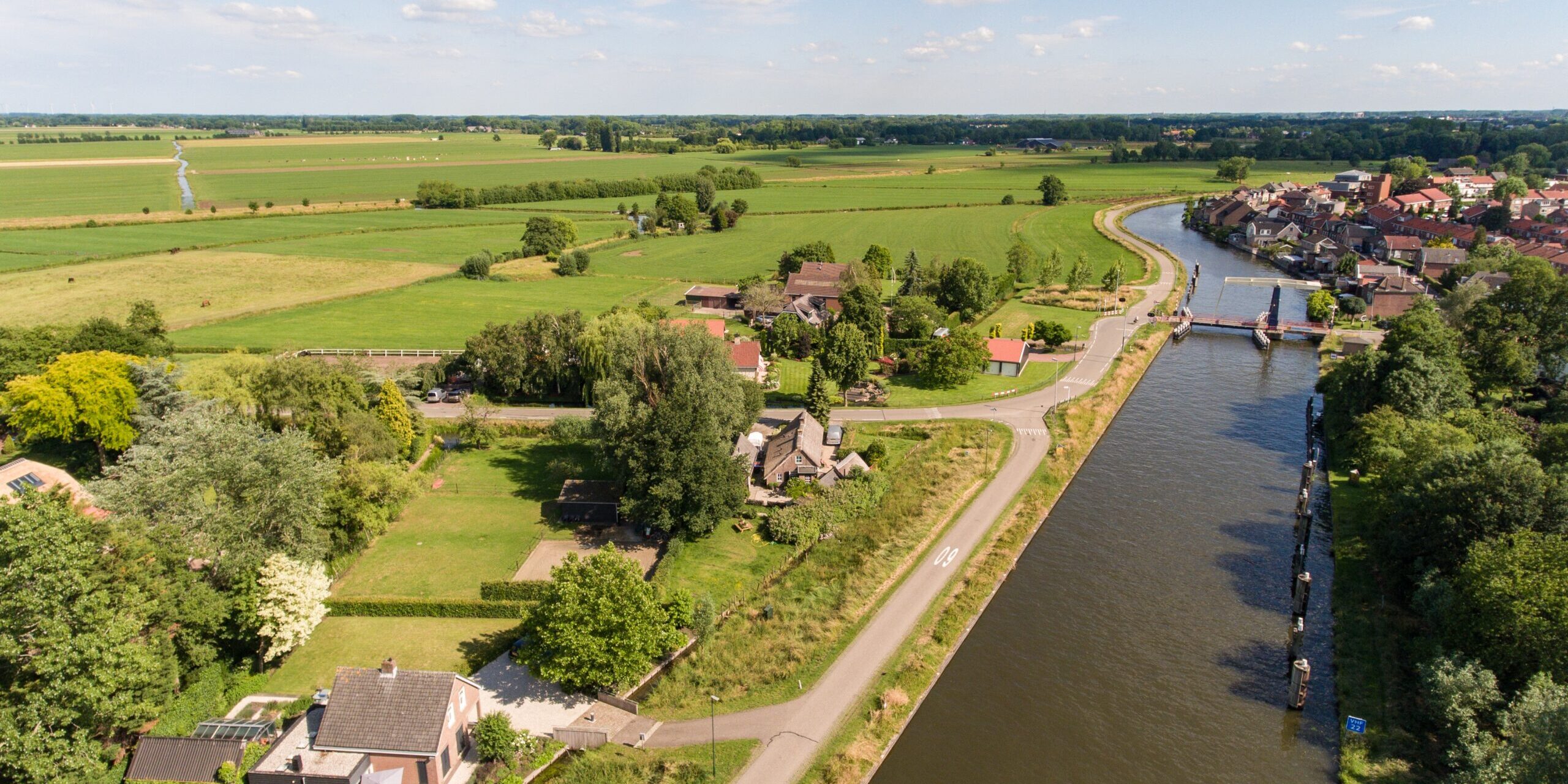 An aerial shot of the Zederik canal near the Arkel village located in the Netherlands